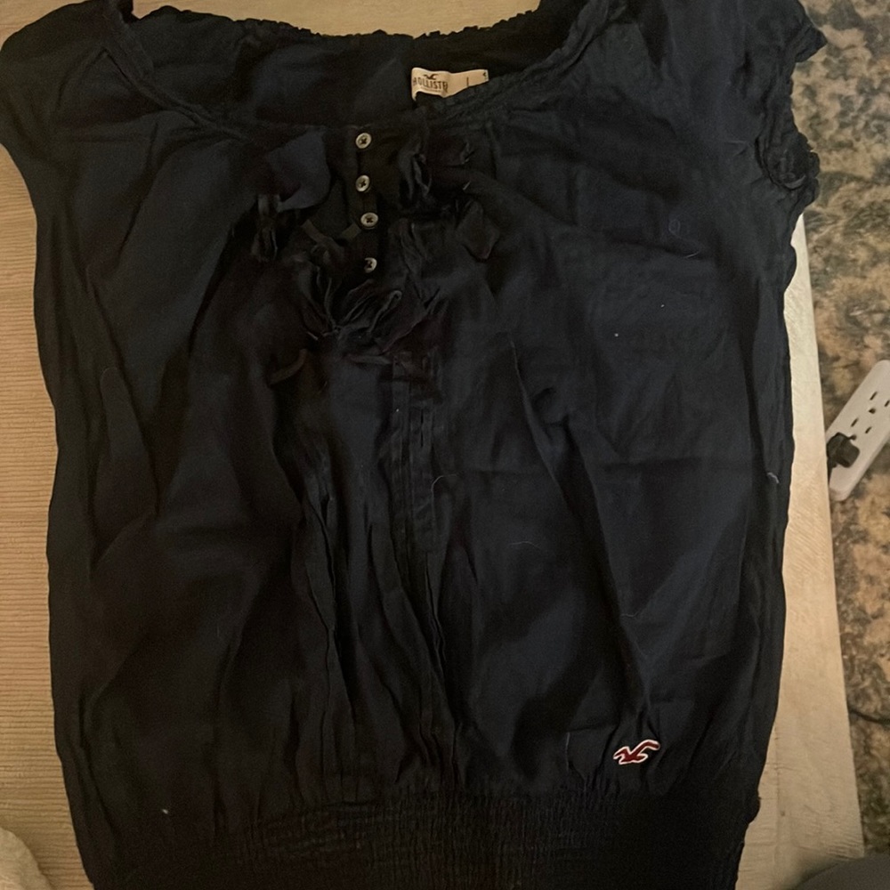 Navy hollister shirt with floral appliqués